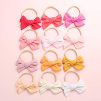 Wholesale Children's Cotton Bow Hair Circle Infant Baby Solid Color Super Soft Headband - PrettyKid